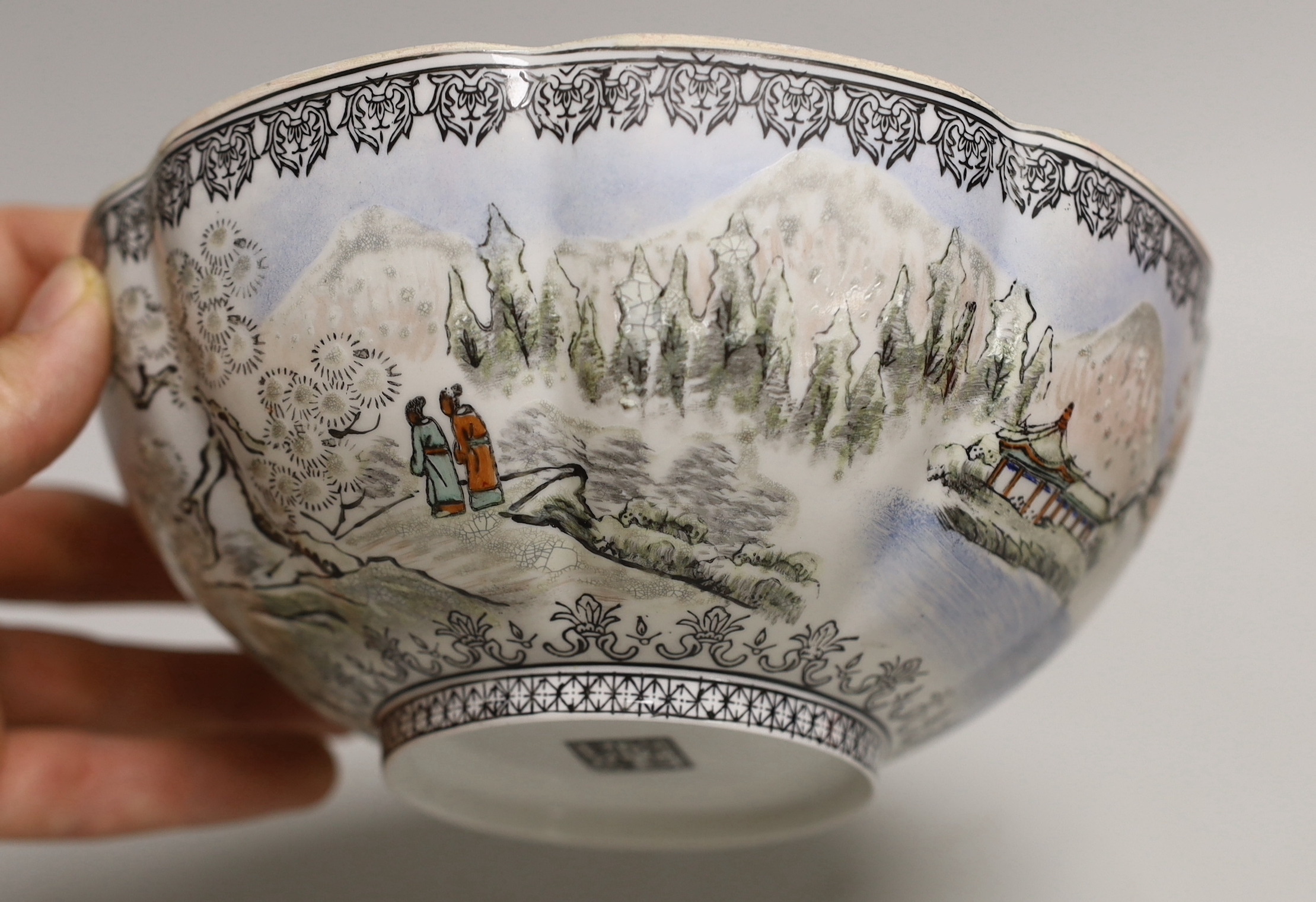 A Chinese eggshell bowl in fitted box, decorated with a mountainous landscape, 18cm in diameter